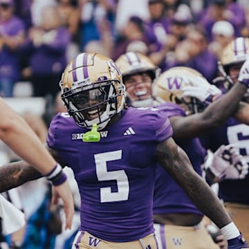 Will Rogers and Giles Jackson greet each other after another pass completion. 