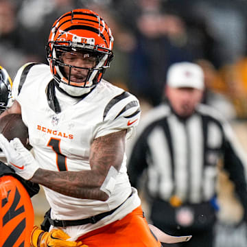 Cincinnati Bengals wide receiver Ja'Marr Chase (1) runs with a catch in the fourth quarter of the NFL Week 18 game between the Pittsburgh Steelers and the Cincinnati Bengals at Acrisure Stadium in Pittsburgh on Saturday, Jan. 4, 2025. The Bengals won 19-17 to finish the regular season at 9-8.