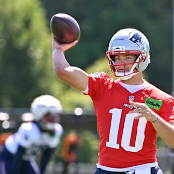 Jul 23, 2025; Foxborough, MA, USA; New England Patriots quarterback Drake Maye (10) throws a pass during training camp at Gillette Stadium. Mandatory Credit: Eric Canha-Imagn Images