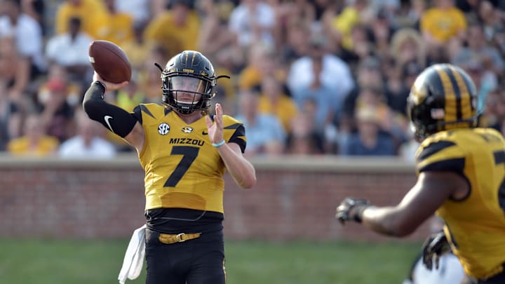 Missouri Tigers quarterback Maty Mauk (7) throws a pass to wide receiver Nate Brown (2) during the second half against the Southeast Missouri State Redhawks at Faurot Field. Missouri won 34-3. Mandatory Credit: Denny Medley-Imagn Images