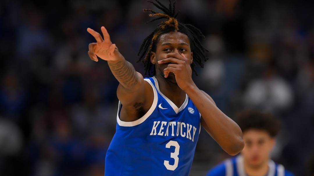 Mar 12, 2026; Nashville, TN, USA;  Kentucky Wildcats guard Kam Williams (3) reacts after a made three point basket against the Missouri Tigers during the first half at Bridgestone Arena. Mandatory Credit: Steve Roberts-Imagn Images
