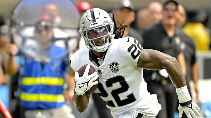 Sep 8, 2024; Inglewood, California, USA; Las Vegas Raiders running back Alexander Mattison (22) runs for a touchdown in the first half against the Los Angeles Chargers at SoFi Stadium. Mandatory Credit: Jayne Kamin-Oncea-Imagn Images