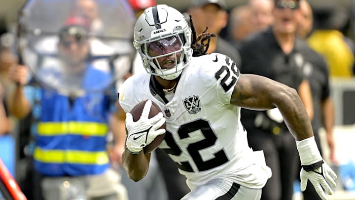 Sep 8, 2024; Inglewood, California, USA; Las Vegas Raiders running back Alexander Mattison (22) runs for a touchdown in the first half against the Los Angeles Chargers at SoFi Stadium. Mandatory Credit: Jayne Kamin-Oncea-Imagn Images