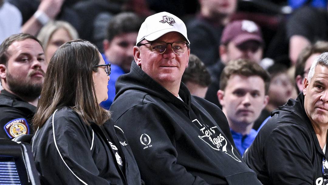 Feb 7, 2026; College Station, Texas, USA; Texas A&M Aggies head football coach Mike Elko sits court side during the Men’s basketball game against the Florida Gators at Reed Arena. Feb 7, 2026; College Station, Texas, USA; Texas A&M Aggies head football coach Mike Elko sits court side during the Men’s basketball game against the Florida Gators at Reed Arena.