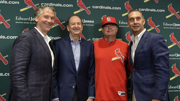 Jul 15, 2018; St. Louis, MO, USA; St. Louis Cardinals interim manager Mike Shildt (83) and president of baseball operations John Mozeliak and chairman Bill DeWitt Jr and general manager Mike Girsch pose for a photo after introduce Shildt as the interim manager during a press conference at Busch Stadium. Mandatory Credit: Jeff Curry-USA TODAY Sports