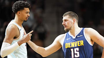 Jan 4, 2025; San Antonio, Texas, USA; San Antonio Spurs center Victor Wembanyama (1) greets Denver Nuggets center Nikola Jokic (15) before a game at Frost Bank Center.
