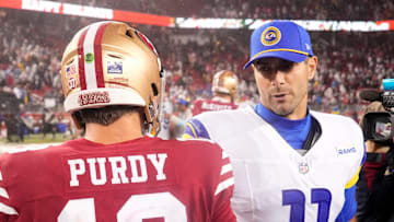 Los Angeles Rams quarterback Jimmy Garoppolo (R) and San Francisco 49ers quarterback Brock Purdy (L)