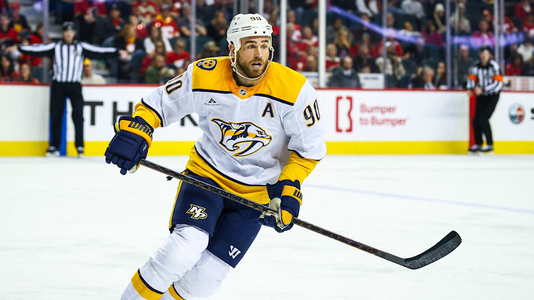 Jan 4, 2025; Calgary, Alberta, CAN; Nashville Predators center Ryan O'Reilly (90) skates against the Calgary Flames during the third period at Scotiabank Saddledome. Mandatory Credit: Sergei Belski-Imagn Images