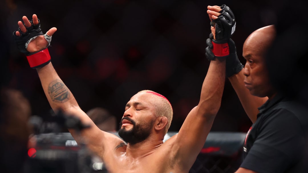 Apr 13, 2024; Las Vegas, Nevada, USA; Deiveson Figueiredo (red gloves) reacts after defeating Cody Garbrandt (not pictured) during UFC 300 at T-Mobile Arena. Mandatory Credit: Mark J. Rebilas-USA TODAY Sports