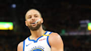 Golden State Warriors guard Stephen Curry stands on the court against the Houston Rockets.