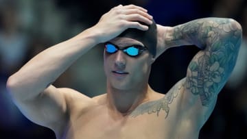 Caeleb Dressel prepares to compete in the 100-meter freestyle final Wednesday, June 19, 2024, during the fifth day of competition for the U.S. Olympic Team Swimming Trials at Lucas Oil Stadium in Indianapolis.