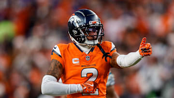 Dec 15, 2024; Denver, Colorado, USA; Denver Broncos cornerback Pat Surtain II (2) gestures after a play in the third quarter against the Indianapolis Colts at Empower Field at Mile High. 