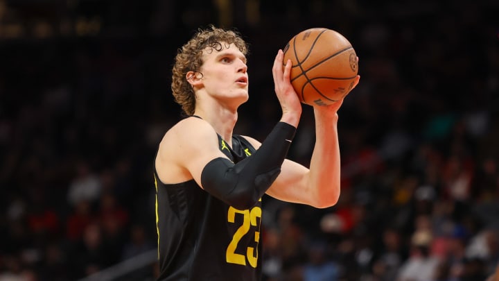 Feb 27, 2024; Atlanta, Georgia, USA; Utah Jazz forward Lauri Markkanen (23) shoots a free throw against the Atlanta Hawks in the second half at State Farm Arena. Mandatory Credit: Brett Davis-USA TODAY Sports