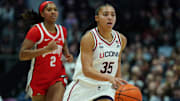 Nov 16, 2025; Hartford, Connecticut, USA; UConn Huskies guard Azzi Fudd (35) returns the ball against Ohio State Buckeyes guard Chance Gray (2) in the first half at Peoples Bank Arena. Mandatory Credit: David Butler II-Imagn Images