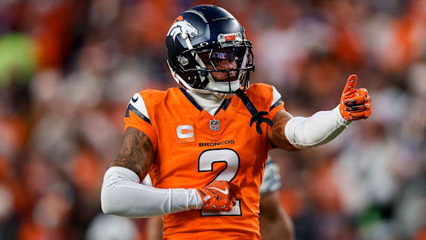 Denver Broncos cornerback Pat Surtain II (2) gestures after a play in the third quarter against the Indianapolis Colts.