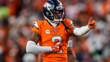 Dec 15, 2024; Denver, Colorado, USA; Denver Broncos cornerback Pat Surtain II (2) gestures after a play in the third quarter against the Indianapolis Colts at Empower Field at Mile High. Mandatory Credit: Isaiah J. Downing-Imagn Images