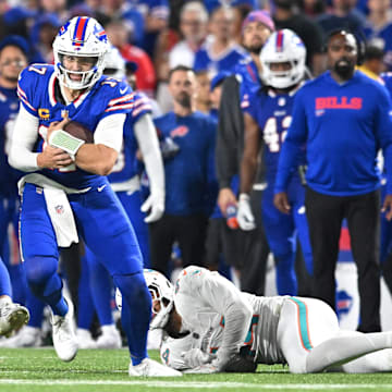Sep 18, 2025; Orchard Park, New York, USA; Buffalo Bills quarterback Josh Allen (17) runs the ball against the Miami Dolphins.