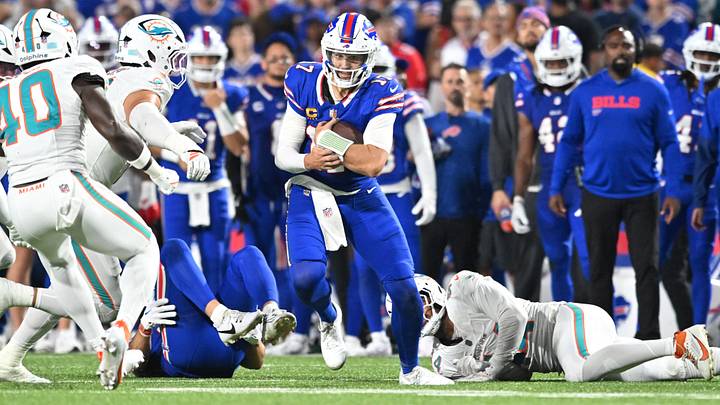 Buffalo Bills quarterback Josh Allen (17) runs the ball against the Miami Dolphins in the second half at Highmark Stadium.