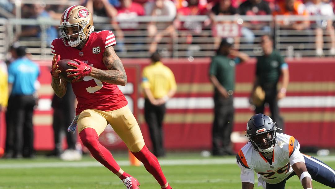 Oct 4, 2026; Santa Clara, California, USA; San Francisco 49ers wide receiver Mike Evans (5) runs after the catch as Denver Broncos cornerback Ja'Quan McMillian (29) goes to the turf during the first half at Levi's Stadium. Mandatory Credit: Darren Yamashita-Imagn Images Oct 4, 2026; Santa Clara, California, USA; San Francisco 49ers wide receiver Mike Evans (5) runs after the catch as Denver Broncos cornerback Ja'Quan McMillian (29) goes to the turf during the first half at Levi's Stadium. Mandatory Credit: Darren Yamashita-Imagn Images