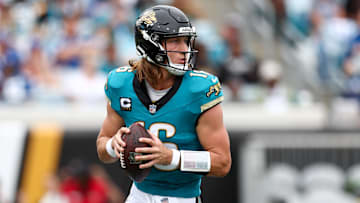 Oct 6, 2024; Jacksonville, Florida, USA; Jacksonville Jaguars quarterback Trevor Lawrence (16) drops back to pass against the Indianapolis Colts in the first quarter at EverBank Stadium. Mandatory Credit: Nathan Ray Seebeck-Imagn Images