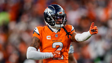 Dec 15, 2024; Denver, Colorado, USA; Denver Broncos cornerback Pat Surtain II (2) gestures after a play in the third quarter against the Indianapolis Colts at Empower Field at Mile High. Mandatory Credit: Isaiah J. Downing-Imagn Images
