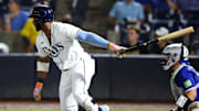Sep 17, 2025; Tampa, Florida, USA; Tampa Bay Rays designated hitter Yandy Diaz (2) hits an rbi single against the Toronto Blue Jays in the first inning at George M. Steinbrenner Field. 