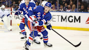 Apr 17, 2025; New York, New York, USA;  New York Rangers right wing Gabe Perreault (94) chases the puck in the first period against the Tampa Bay Lightning at Madison Square Garden. Mandatory Credit: Wendell Cruz-Imagn Images