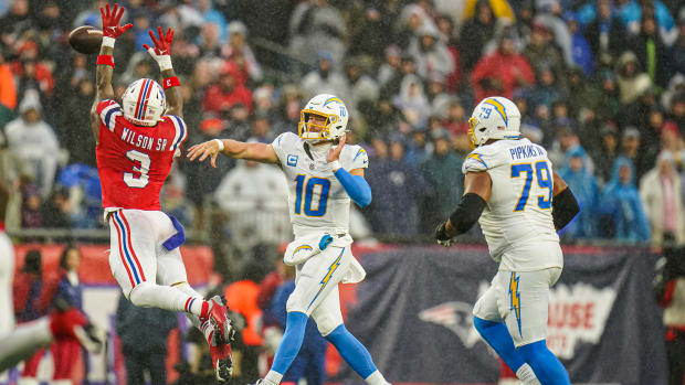 Dec 3, 2023; Foxborough, Massachusetts, USA; Los Angeles Chargers quarterback Justin Herbert (10) throws a pass against New E