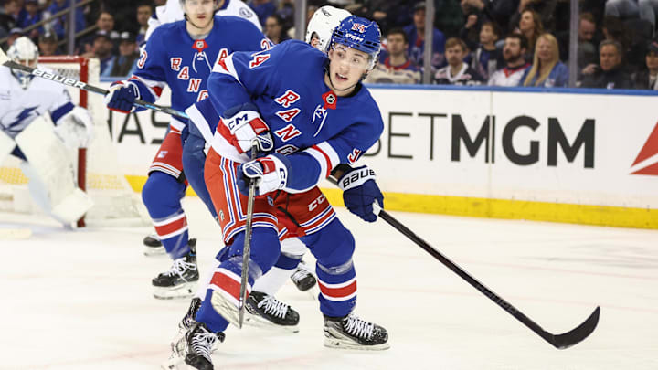 Apr 17, 2025; New York, New York, USA;  New York Rangers right wing Gabe Perreault (94) chases the puck in the first period against the Tampa Bay Lightning at Madison Square Garden. Mandatory Credit: Wendell Cruz-Imagn Images