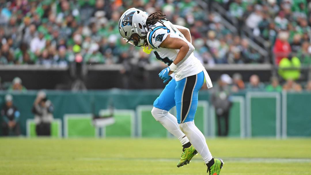 Dec 8, 2024; Philadelphia, Pennsylvania, USA; Carolina Panthers running back Jonathon Brooks (24) tries to get off the field after being injured against the Philadelphia Eagles at Lincoln Financial Field. Mandatory Credit: Eric Hartline-Imagn Images