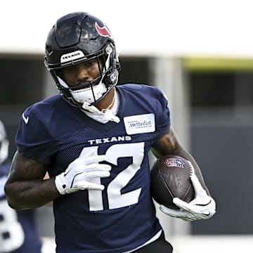 Jun 10, 2025; Houston, TX, USA; Houston Texans wide receiver Nico Collins (12) participates in a drill during an NFL football minicamp at NRG Stadium. Mandatory Credit: Maria Lysaker-Imagn Images 