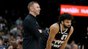 Nov 24, 2025; Memphis, Tennessee, USA; Denver Nuggets head coach David Adelman and guard Jamal Murray (27) looks on during the fourth quarter against the Memphis Grizzlies at FedExForum.