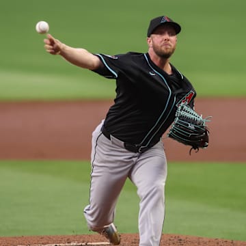 Atlanta, Georgia, USA; Arizona Diamondbacks starting pitcher Merrill Kelly (29) throws against the Atlanta Braves in the first inning at Truist Park.