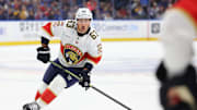 Oct 18, 2025; Buffalo, New York, USA;  Florida Panthers left wing Brad Marchand (63) looks to pass during the first period against the Buffalo Sabres at KeyBank Center. Mandatory Credit: Timothy T. Ludwig-Imagn Images