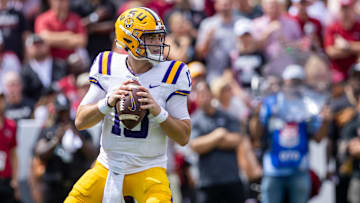 Sep 14, 2024; Columbia, South Carolina, USA; LSU Tigers quarterback Garrett Nussmeier (13) drops back to throw against the South Carolina Gamecocks in the first quarter at Williams-Brice Stadium. Mandatory Credit: Scott Kinser-Imagn Images