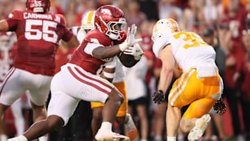 Oct 5, 2024; Fayetteville, Arkansas, USA; Arkansas Razorbacks running back Braylen Russell (0) rushes in the first quarter against the Tennessee Volunteers at Donald W. Reynolds Razorback Stadium. Mandatory Credit: Nelson Chenault-Imagn Images