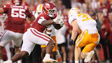 Oct 5, 2024; Fayetteville, Arkansas, USA; Arkansas Razorbacks running back Braylen Russell (0) rushes in the first quarter against the Tennessee Volunteers at Donald W. Reynolds Razorback Stadium. Mandatory Credit: Nelson Chenault-Imagn Images