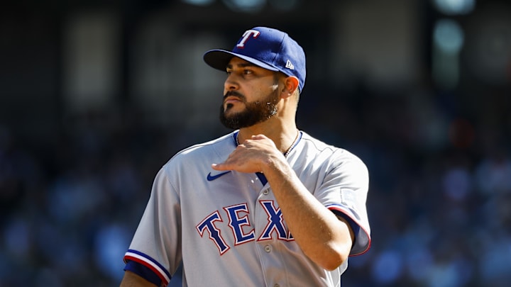 Oct 1, 2023; Seattle, Washington, USA; Texas Rangers relief pitcher Martin Perez (54) reacts after getting the final out of the seventh inning against the Seattle Mariners at T-Mobile Park. Mandatory Credit: Joe Nicholson-Imagn Images