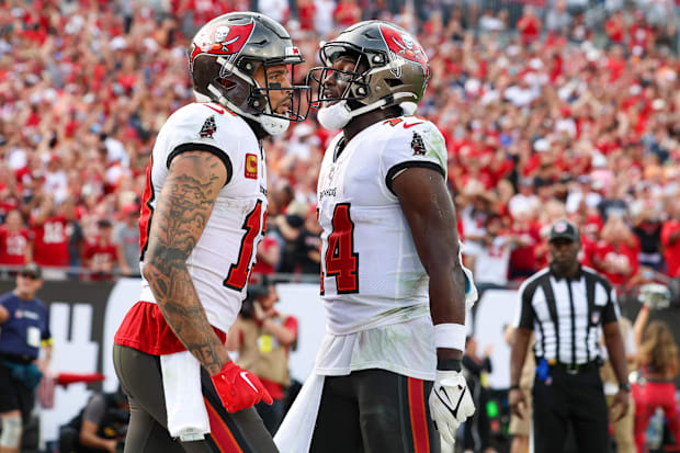 Tampa Bay Buccaneers wide receiver Chris Godwin congratulates wide receiver Mike Evans