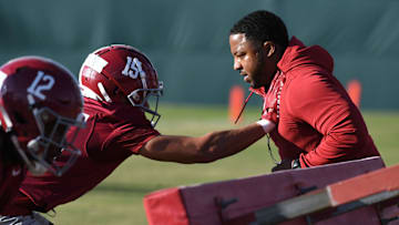 Mar 6, 2024; Tuscaloosa, Alabama, USA; Co-defensive coordinator Maurice Linguist works with linebacker Keanu Koht during practice of the Alabama Crimson Tide football team Wednesday.