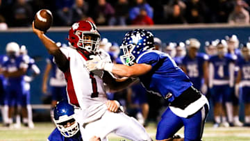 Brockton's Cameron Monteiro gets hit as he throws during a game against Methuen in the Division 1 state tournament on Friday, Nov. 4, 2022.

Methuen7 2