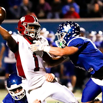 Brockton's Cameron Monteiro gets hit as he throws during a game against Methuen in the Division 1 state tournament on Friday, Nov. 4, 2022.

Methuen7 2