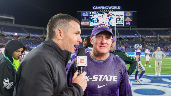 Dec 28, 2023; Orlando, FL, USA;  Kansas State Wildcats head coach Chris Klieman celebrates after beating the North Carolina State Wolfpack in the Pop-Tarts bowl at Camping World Stadium. Mandatory Credit: Nathan Ray Seebeck-USA TODAY Sports