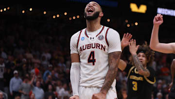 Mar 28, 2025; Atlanta, GA, USA; Auburn Tigers forward Johni Broome (4) reacts after a play in the second half of a South Regional semifinal of the 2025 NCAA tournament against the Michigan Wolverines at State Farm Arena. Mandatory Credit: Brett Davis-Imagn Images