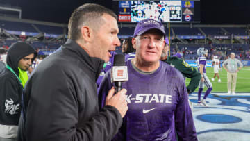 Dec 28, 2023; Orlando, FL, USA;  Kansas State Wildcats head coach Chris Klieman celebrates after beating the North Carolina State Wolfpack in the Pop-Tarts Bowl at Camping World Stadium. Mandatory Credit: Nathan Ray Seebeck-USA TODAY Sports