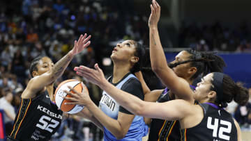 May 25, 2024; Chicago, Illinois, USA; Chicago Sky forward Angel Reese (5) goes to the basket against the Connecticut Sun during the second half of a WNBA game at Wintrust Arena. Mandatory Credit: Kamil Krzaczynski-USA TODAY Sports