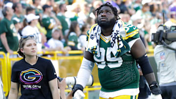 Green Bay Packers defensive tackle Devonte Wyatt (95) leaves the field in the fourth quarter during their football game against the Minnesota Vikings Sunday, September 29, 2024, at Lambeau Field in Green Bay, Wisconsin.