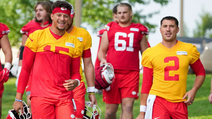 Jul 22, 2024; St. Joseph, MO, USA; Kansas City Chiefs quarterback Patrick Mahomes (15) and quarterback Ian Book (2) laugh while walking from the locker room to the fields prior to training camp at Missouri Western State University. 