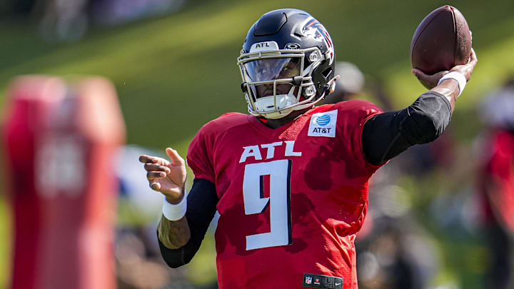 Atlanta Falcons quarterback Michael Penix Jr. (9) passes the ball during practice at training camp at IBM Performance Field.