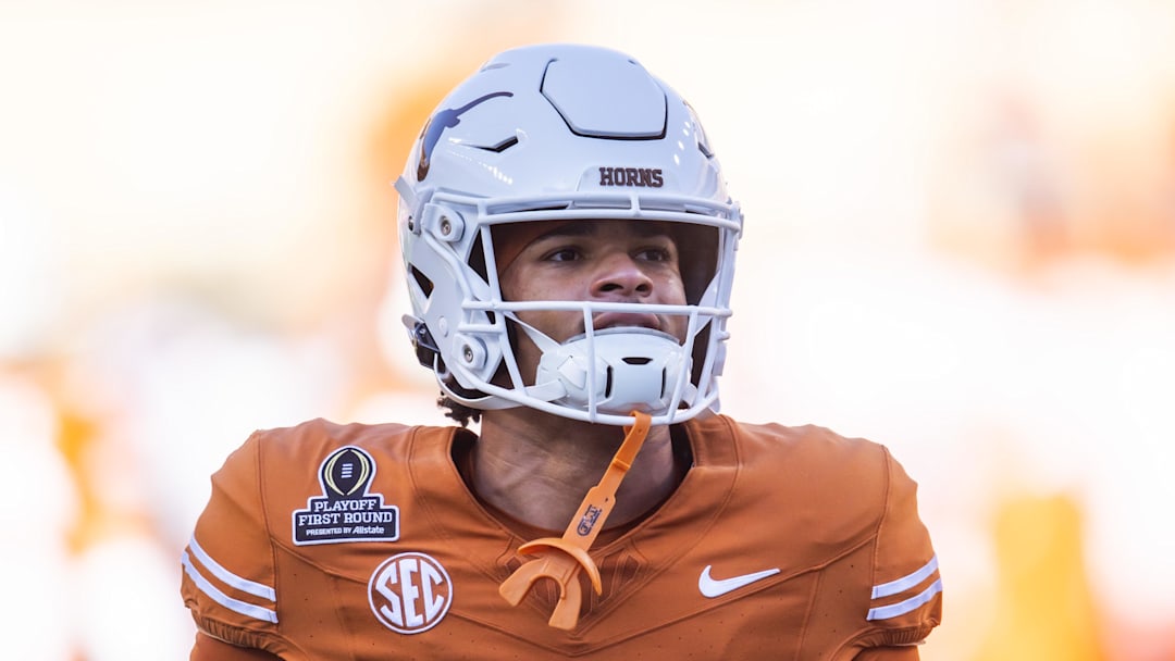 Dec 21, 2024; Austin, Texas, USA; Texas Longhorns wide receiver DeAndre Moore Jr. (0) against the Clemson Tigers during the CFP National playoff first round at Darrell K Royal-Texas Memorial Stadium. Mandatory Credit: Mark J. Rebilas-Imagn Images